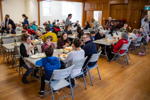 Rockway community at lunch in fellowship hall